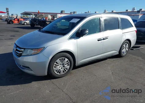 2014 Honda Odyssey Lx z USA, uszkodzony, nr VIN 5FNRL5H23EB006174